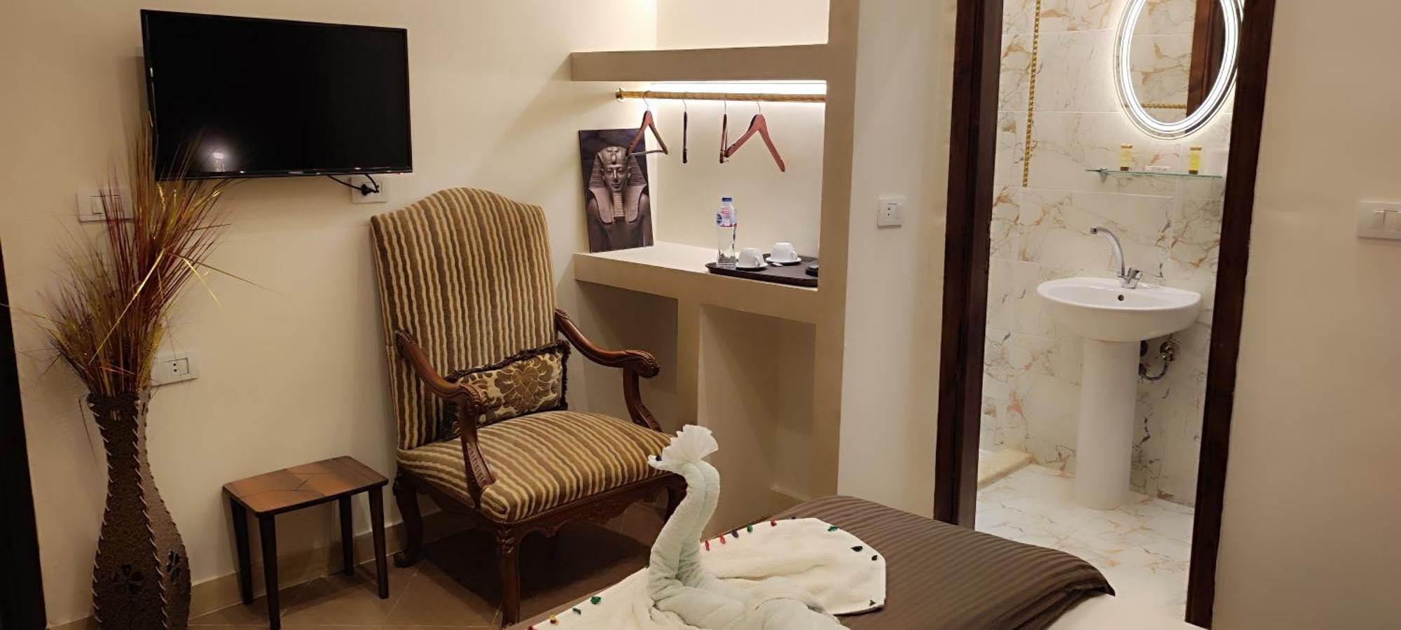 Pyramids Kingdom - Guest House Kafrat al Jabal Bagian luar foto