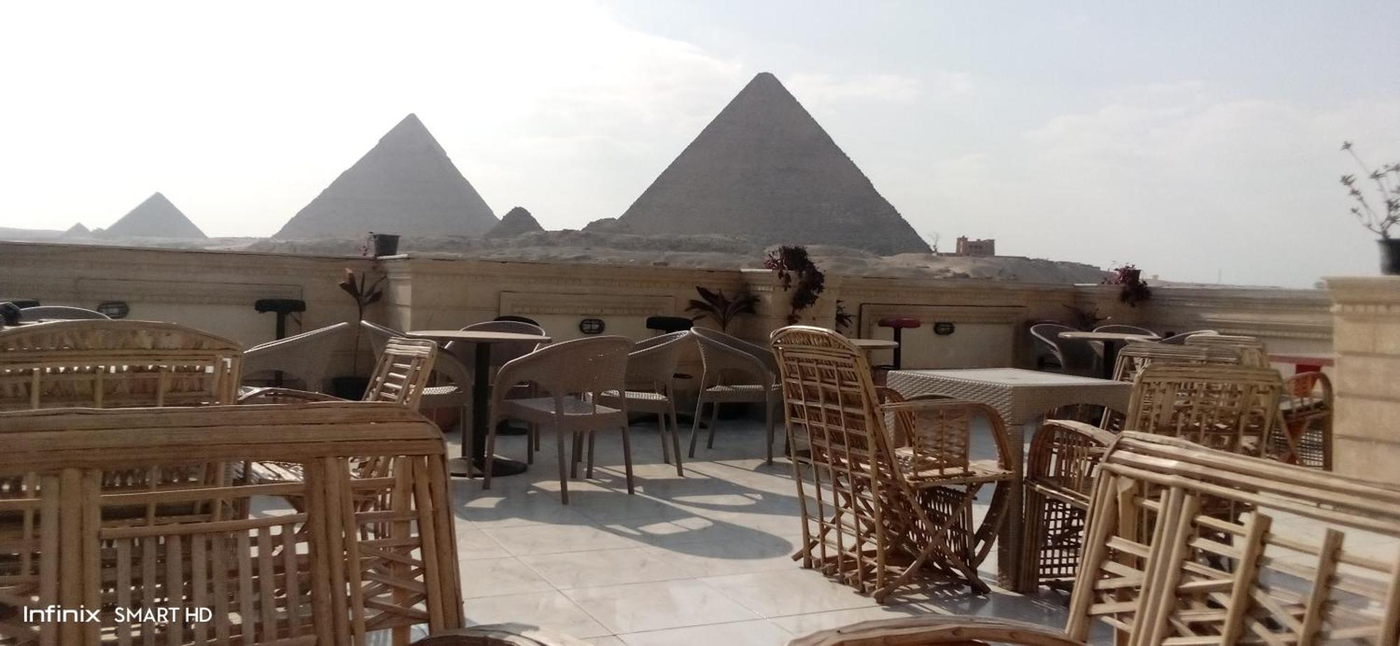 Pyramids Kingdom - Guest House Kafrat al Jabal Bagian luar foto