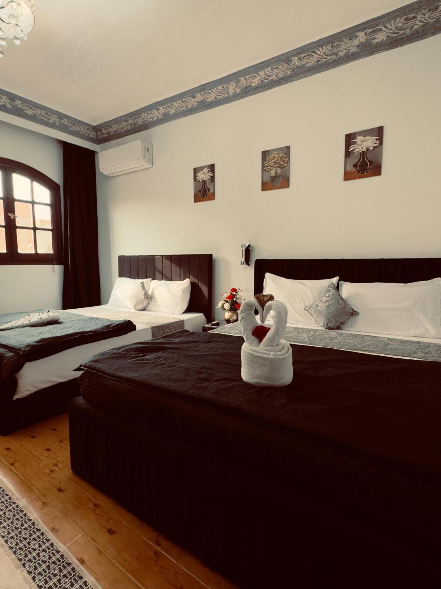 Pyramids Kingdom - Guest House Kafrat al Jabal Bagian luar foto